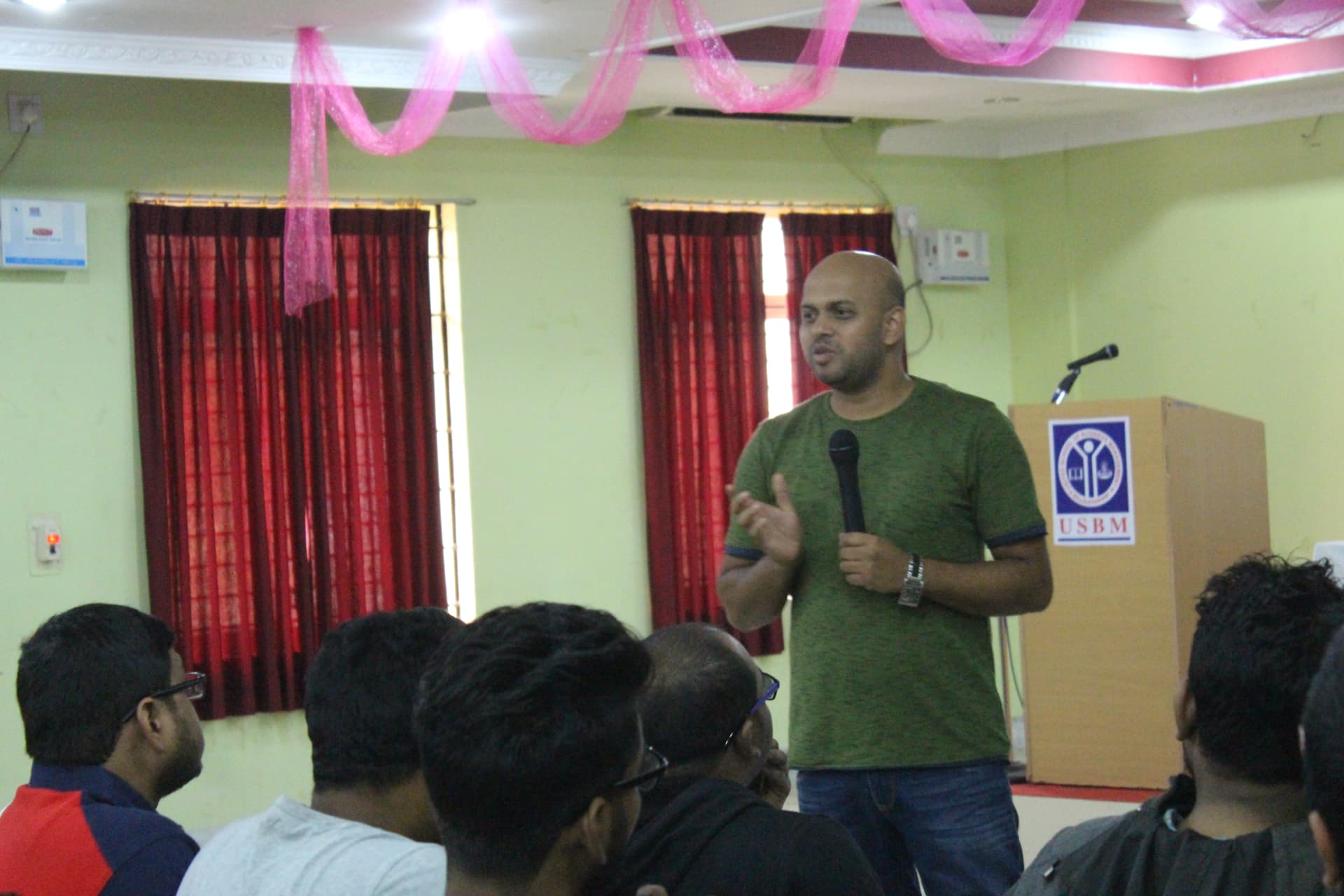 Suvendu Shekhar Giri delivering a keynote to an audience at a C# Corner Bhubaneswar chapter event at USBM